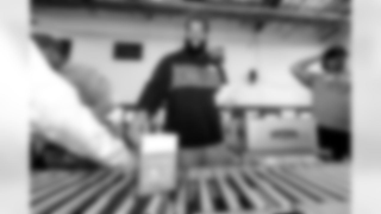 The Los Angeles Chargers participate in a SYNC Snack Box Packaging Event on Monday, June 2, 2025 at LA Regional Food Bank in Los Angeles, CA.