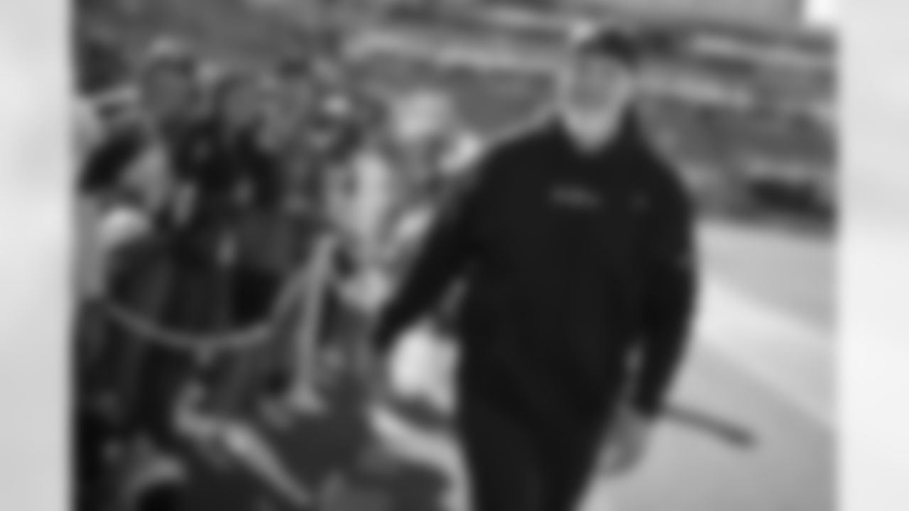 Dallas Cowboys defensive coordinator Dan Quinn walks along the sideline after talking with fans before an NFL football game against the Jacksonville Jaguars, Sunday, Dec. 18, 2022, in Jacksonville, Fla. (AP Photo/Phelan M. Ebenhack)