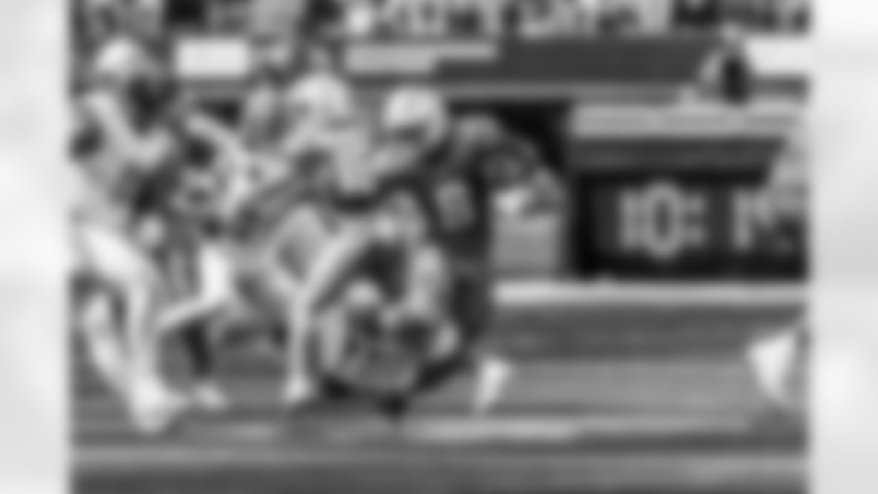 Take a look back at the Chargers Week 5 matchup with the Commanders in monochrome!