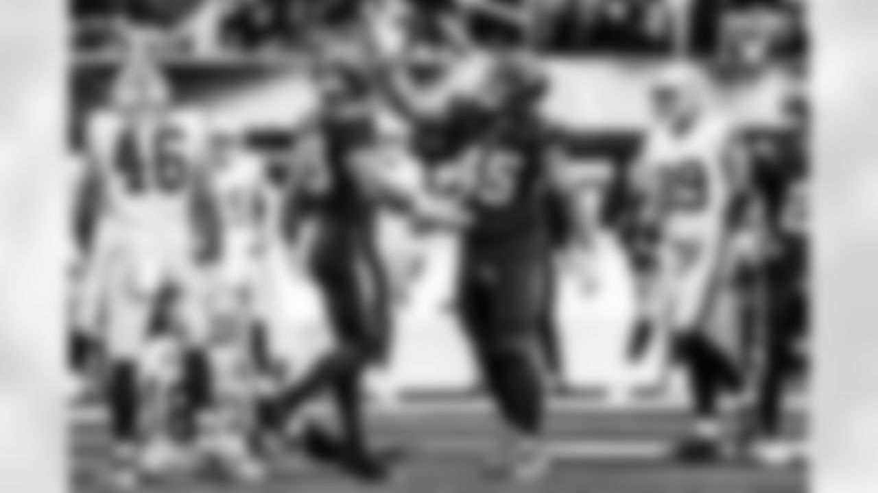 Take a look back at the Chargers Week 13 matchup with the Raiders in monochrome.