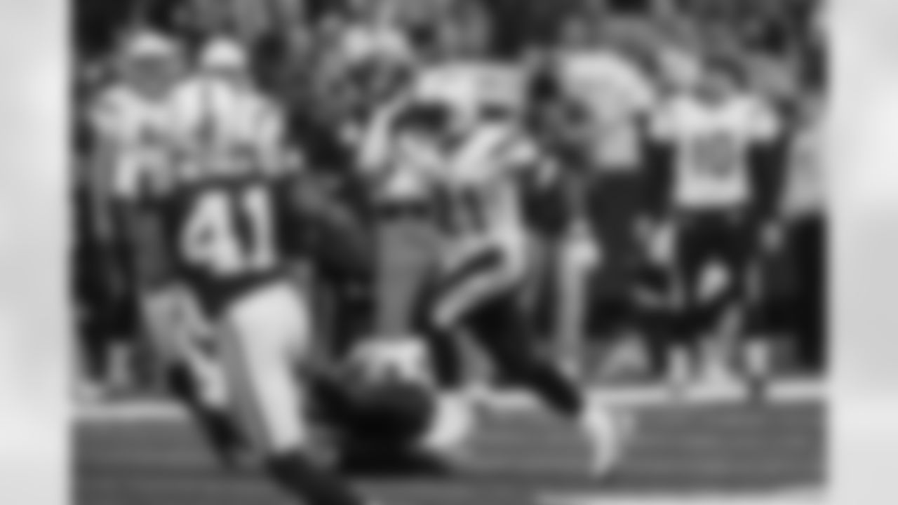 Relive the Chargers' postseason appearances through images from playoff games, highlighting the moments that defined the team in the NFL playoffs.