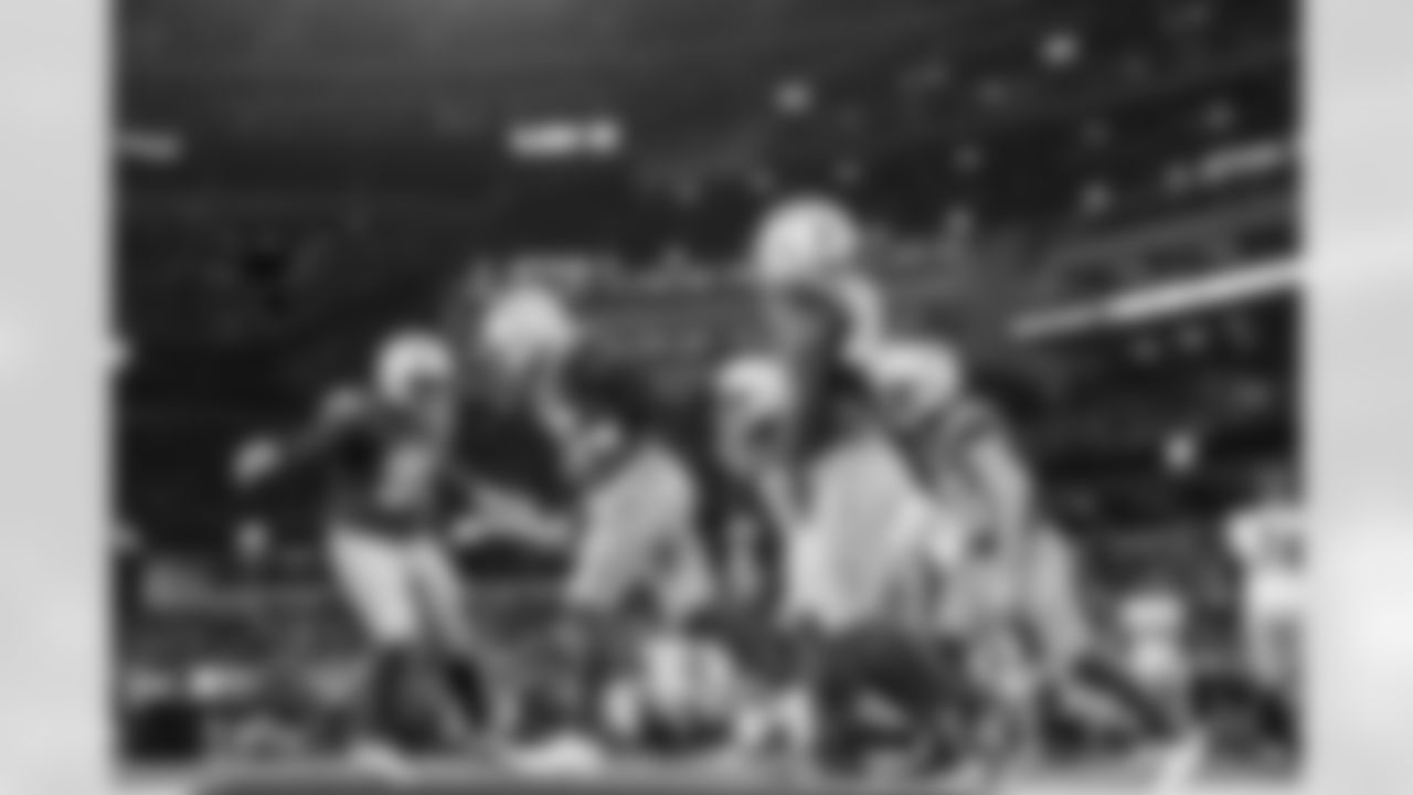 OLB Khalil Mack (52) and DL Da'Shawn Hand (91)