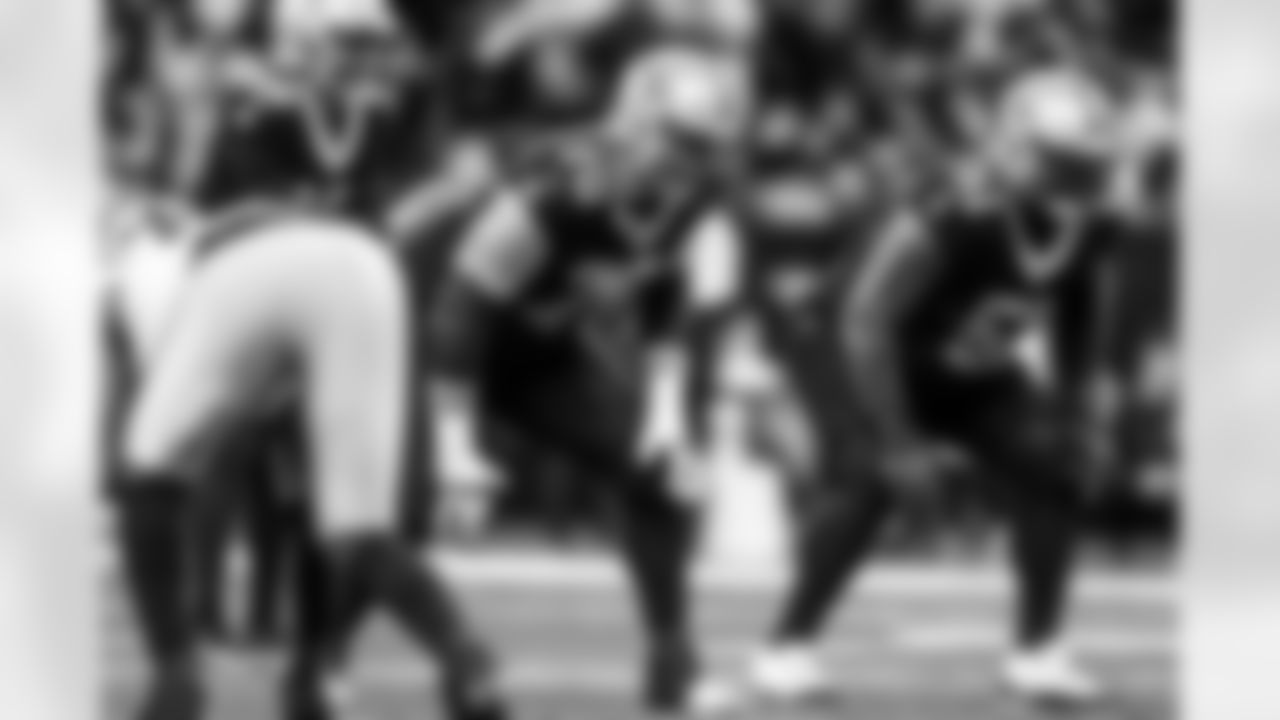 New Orleans Saints offensive tackle Trevor Penning (70) lines up before the snap during an NFL football game against the Las Vegas Raiders, Sunday, Dec. 29, 2024, in New Orleans. The Raiders defeated the Saints 25-10. (Cooper Neill via AP)