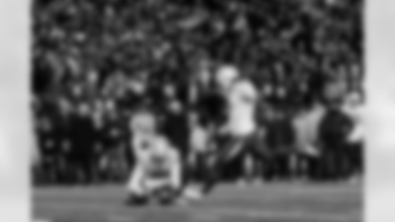 Check out the best shots from the Chargers Wild Card matchup against the Patriots!