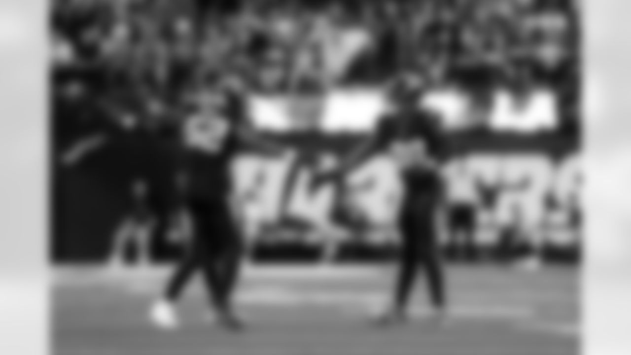 OLB Khalil Mack (52) and OLB Odafe Oweh (98)