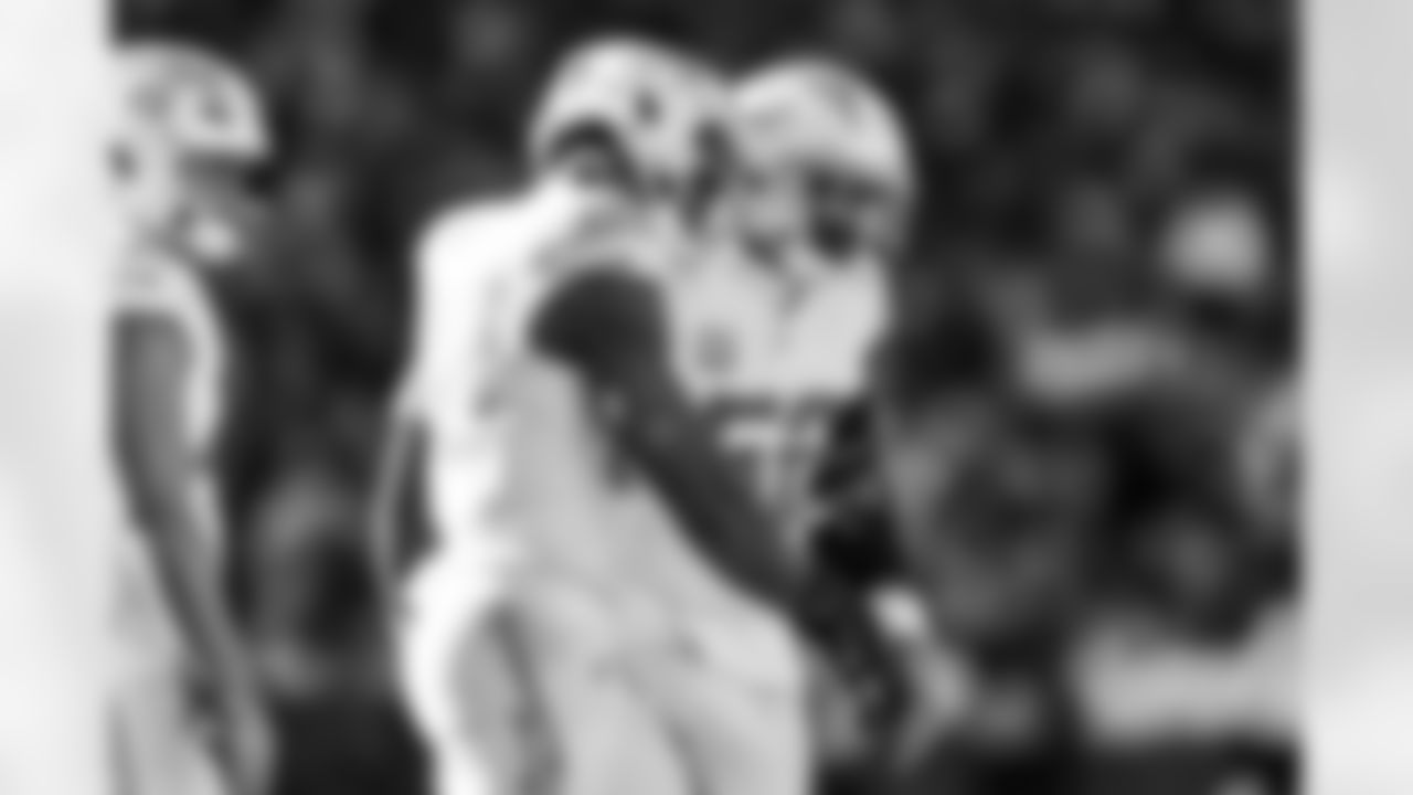 OLB Odafe Oweh (98) and OLB Khalil Mack (52)