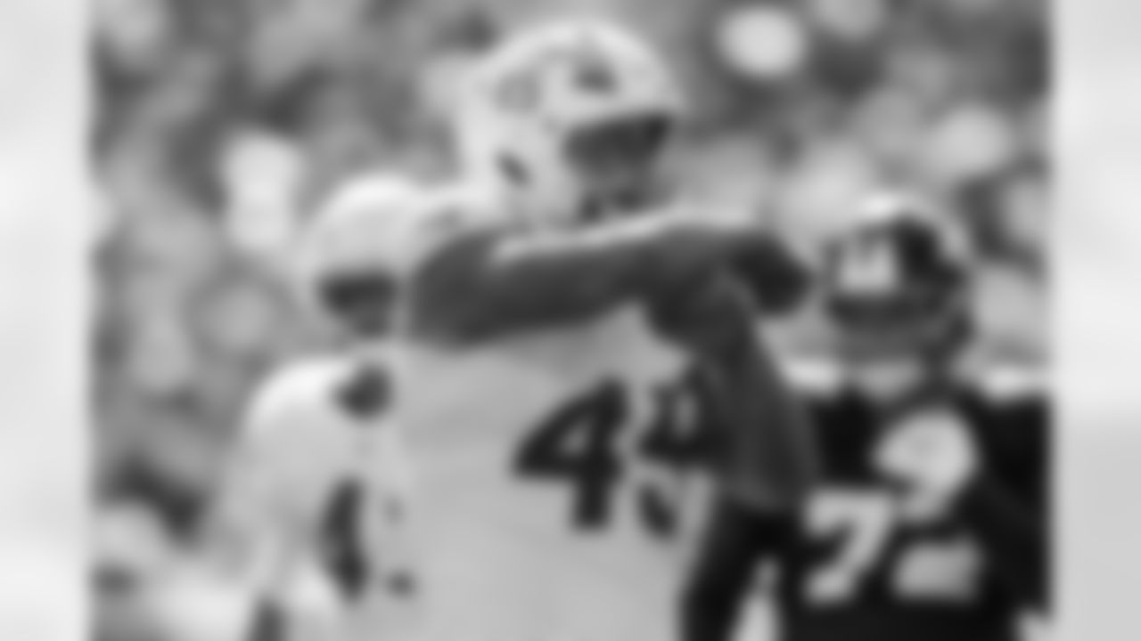 Chargers OLB Tuli Tuipulotu (#45) in action during their Pro Bowl season.