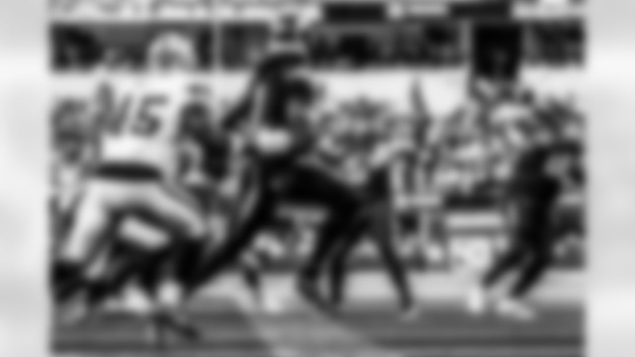 Take a look back at the Chargers Week 13 matchup with the Raiders in monochrome.