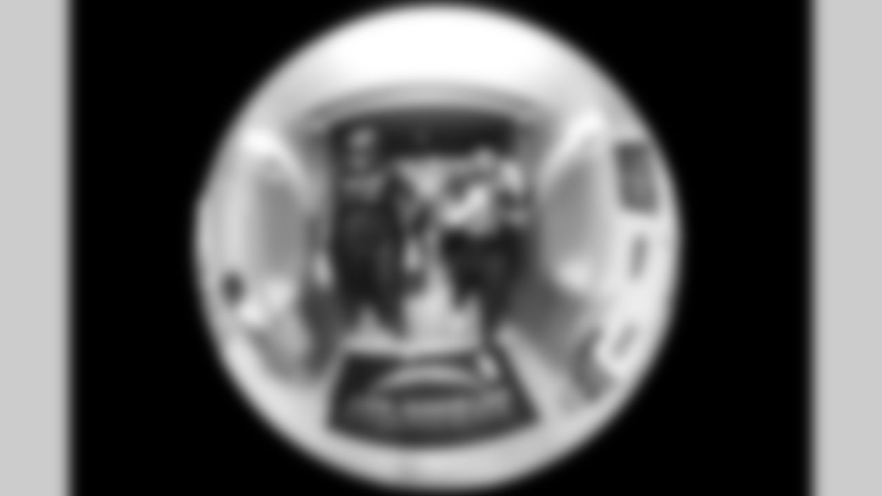 G Mekhi Becton (73) and DL Da'Shawn Hand (91)