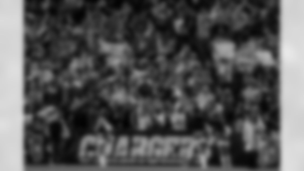 Relive the Chargers' postseason appearances through images from playoff games, highlighting the moments that defined the team in the NFL playoffs.