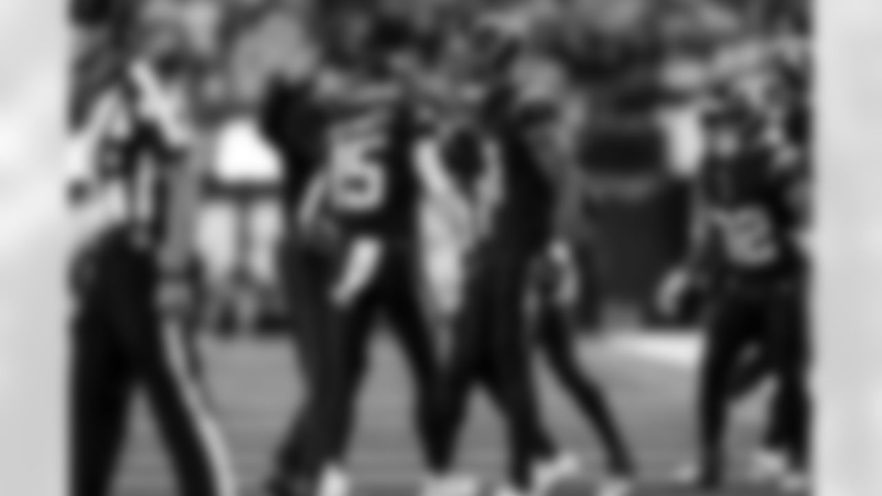 Head Coach Jim Harbaugh and WR Ladd McConkey (15)