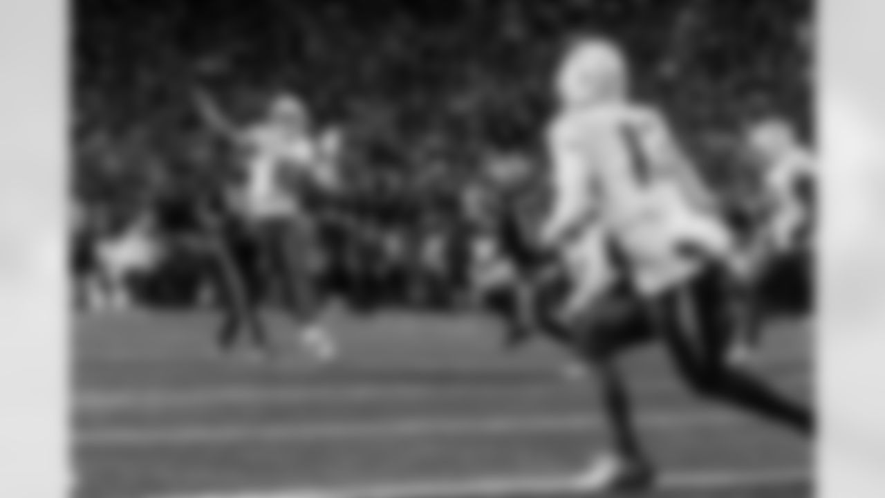 Check out the best shots from the Chargers Wild Card matchup against the Patriots!