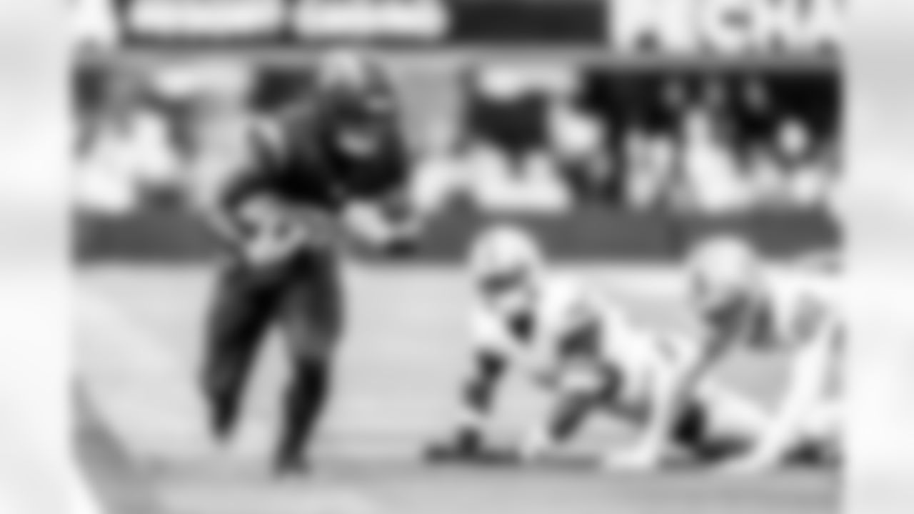 Take a look back at the Chargers Week 13 matchup with the Raiders in monochrome.