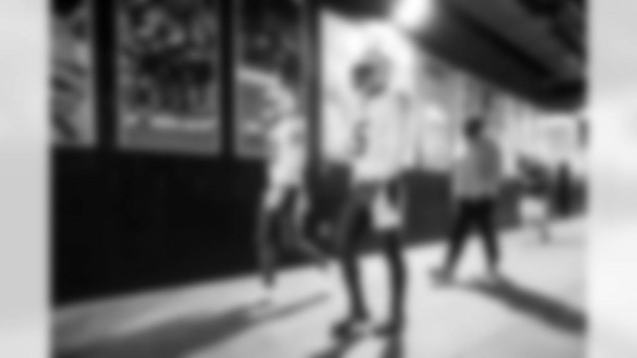 QB Justin Herbert (10) and QB Trey Lance (5)