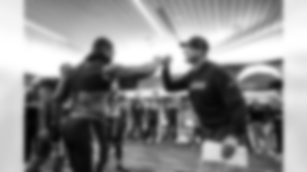 Head Coach Jim Harbaugh and LB Denzel Perryman (6)