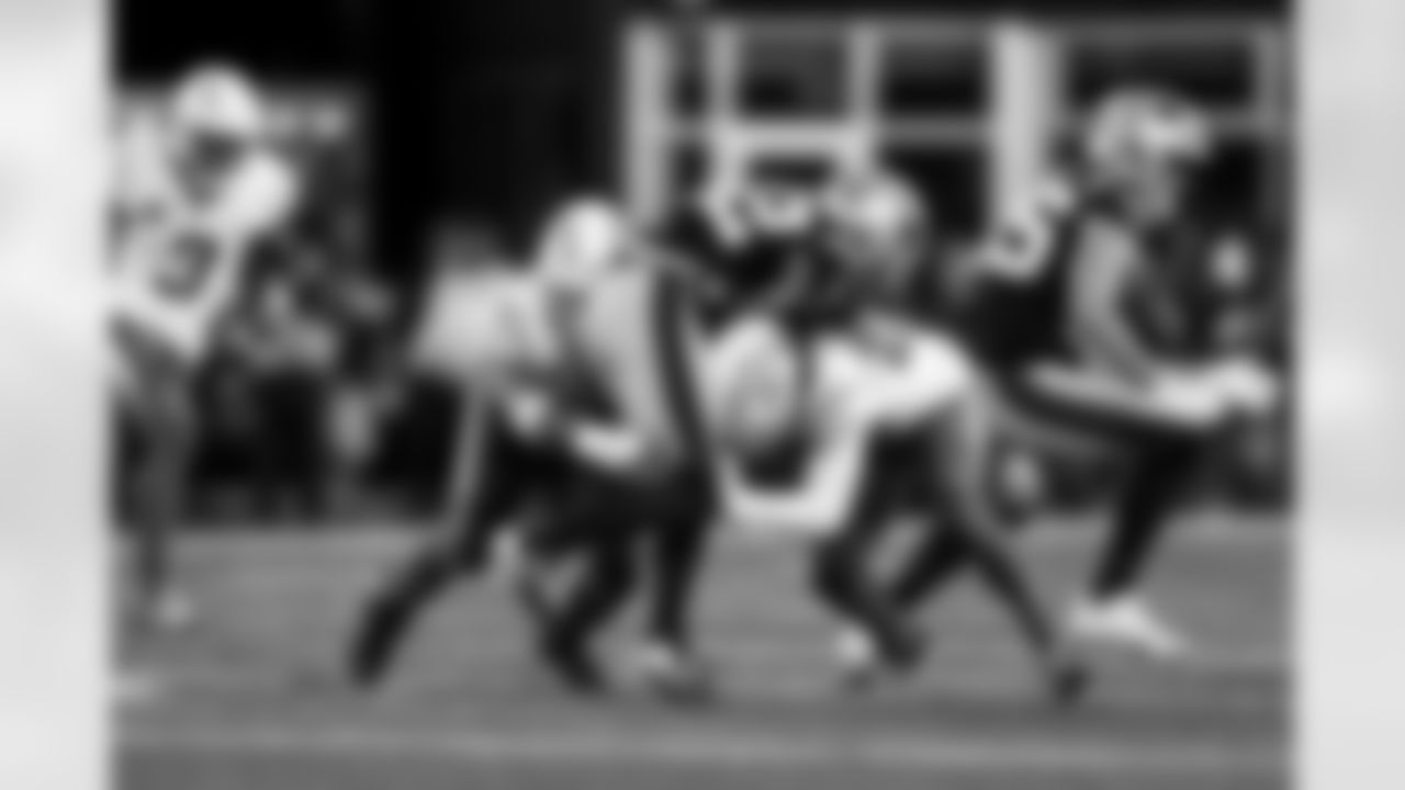 CB Donte Jackson (26) and LB Daiyan Henley (0)