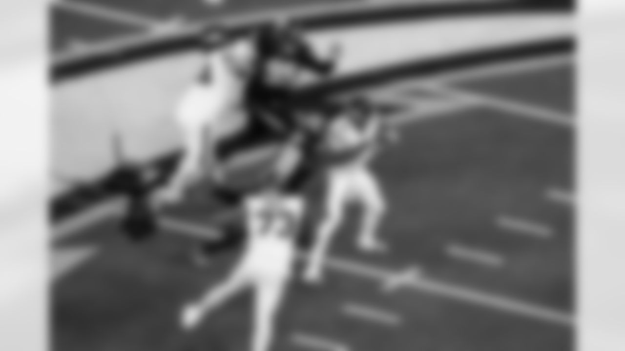 DT Jamaree Caldwell (99) and OLB Odafe Oweh (98)