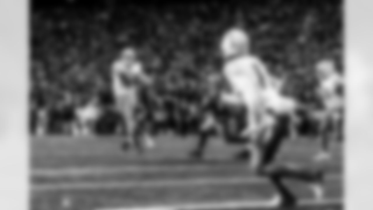 Take a look back at the Chargers Wild Card matchup with the Patriots in monochrome.