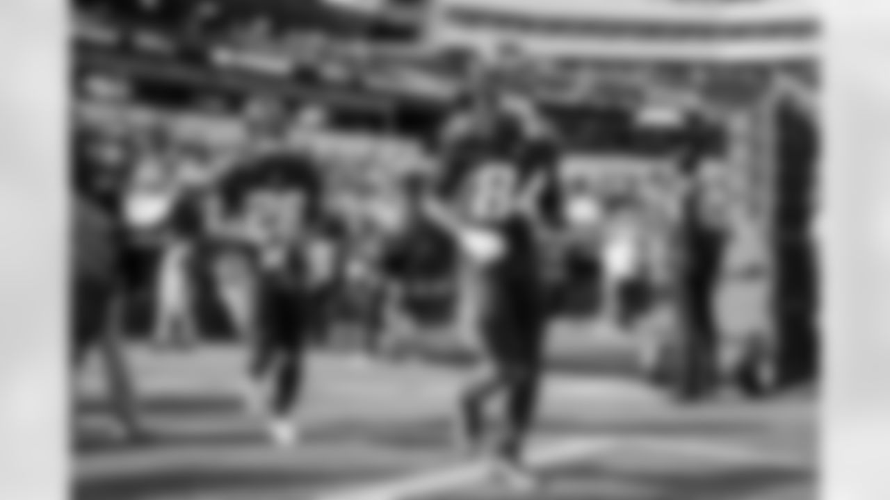 RB Hassan Haskins (28) and WR KeAndre Lambert-Smith (84)