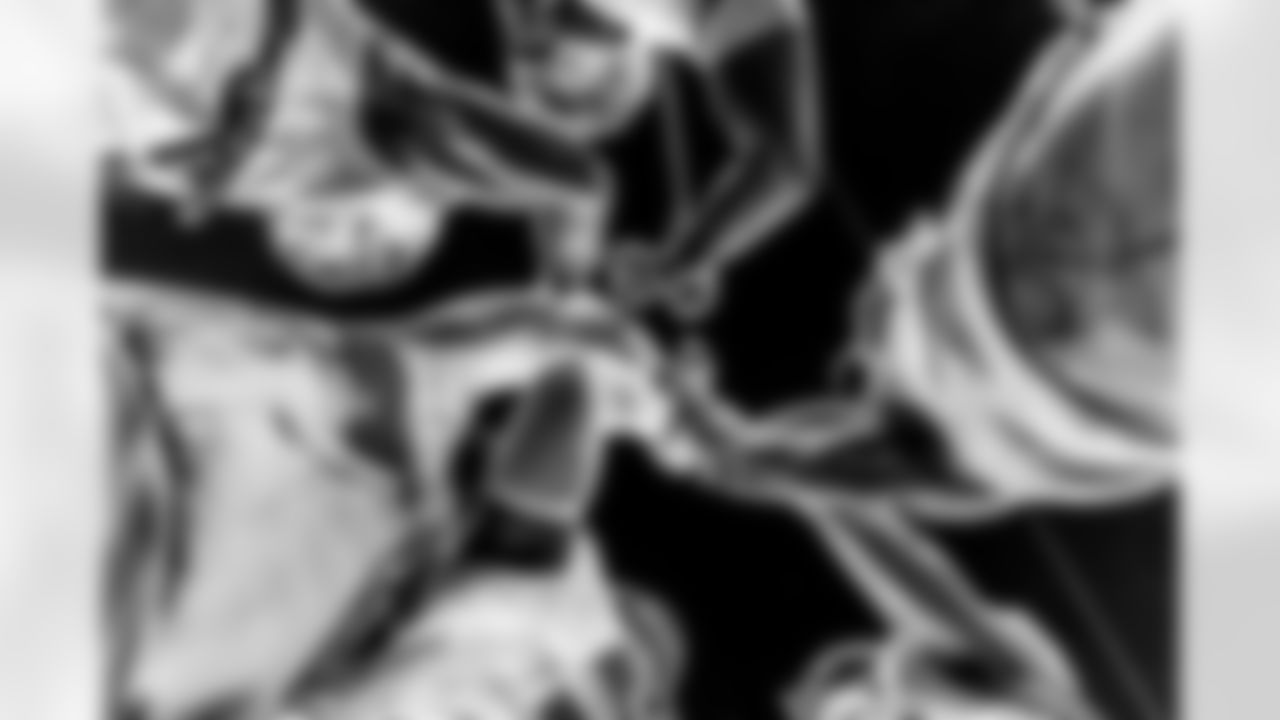 Take a look back at the Chargers Wild Card matchup with the Patriots in monochrome.