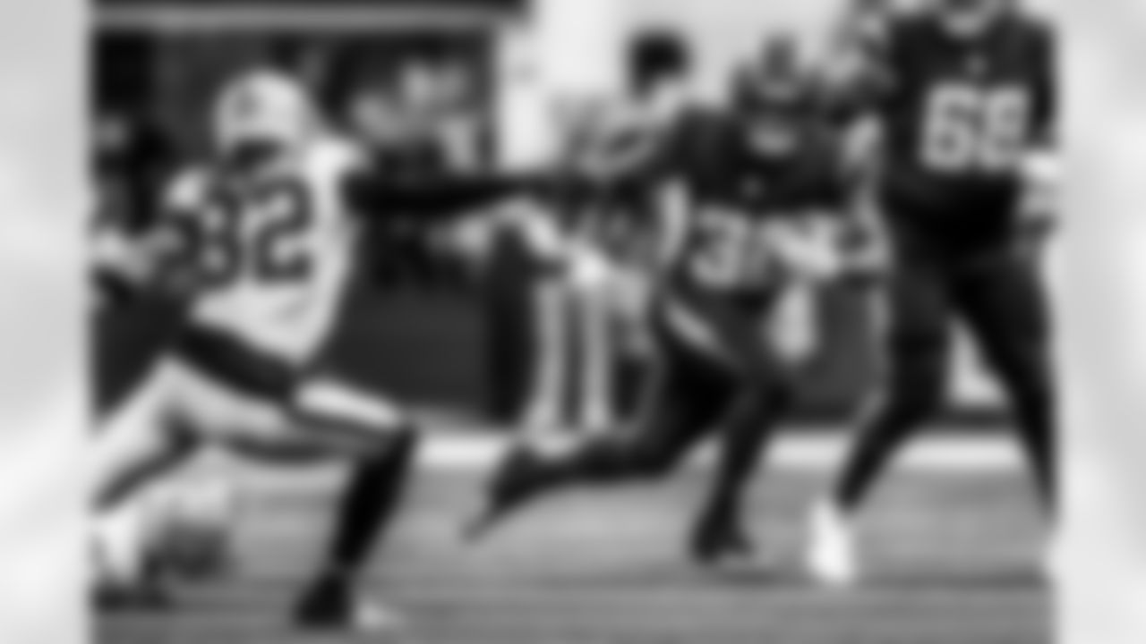 Take a look back at the Chargers Week 13 matchup with the Raiders in monochrome.