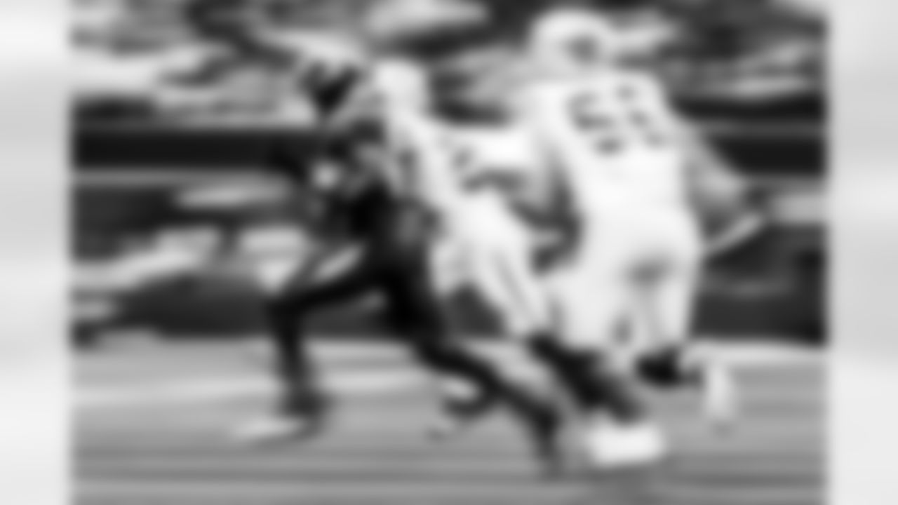 Take a look back at the Chargers Week 13 matchup with the Raiders in monochrome.
