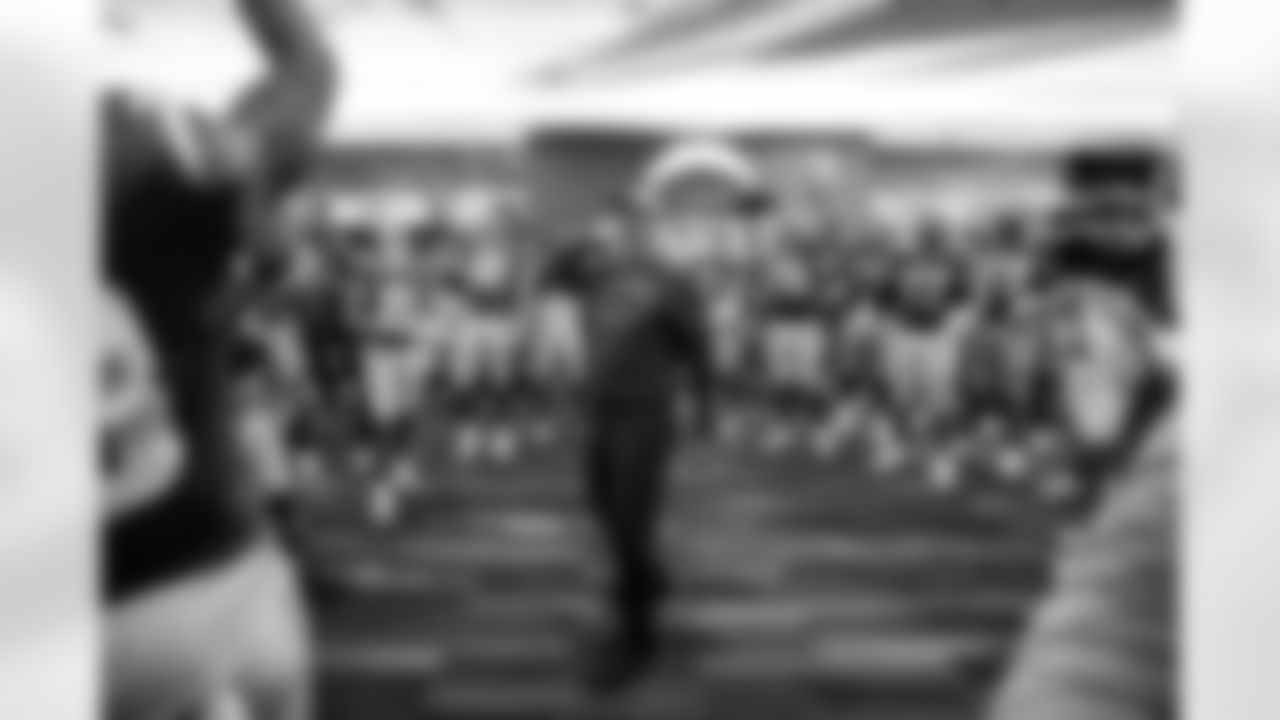 WR Ladd McConkey (15), QB Justin Herbert (10) and Head Coach Jim Harbaugh