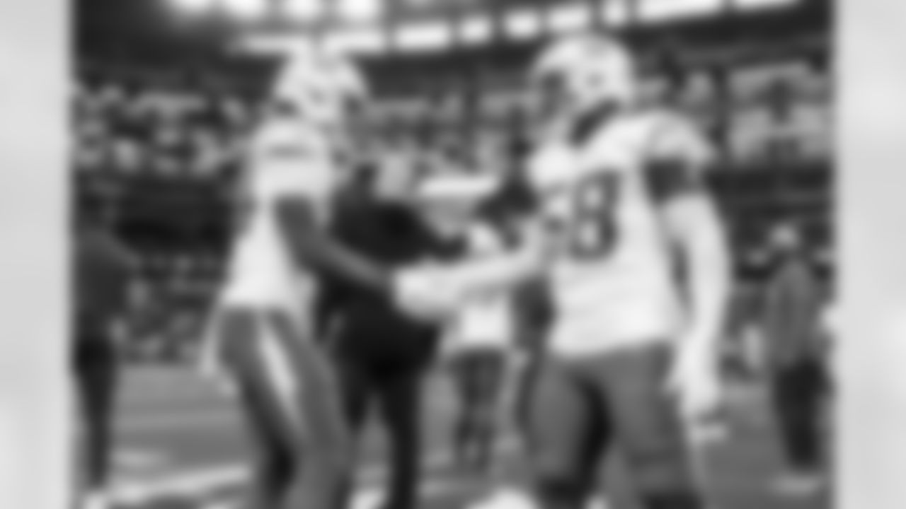 WR KeAndre Lambert-Smith (84) and LB Marlowe Wax (58)