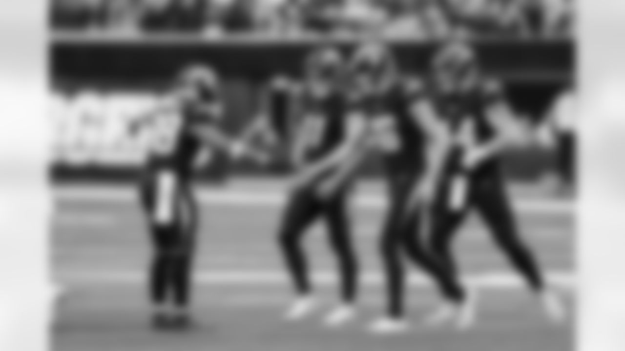 RB Trayveon Williams (38), K Cameron Dicker (11), P JK Scott (16) and DL Scott Matlock (44)