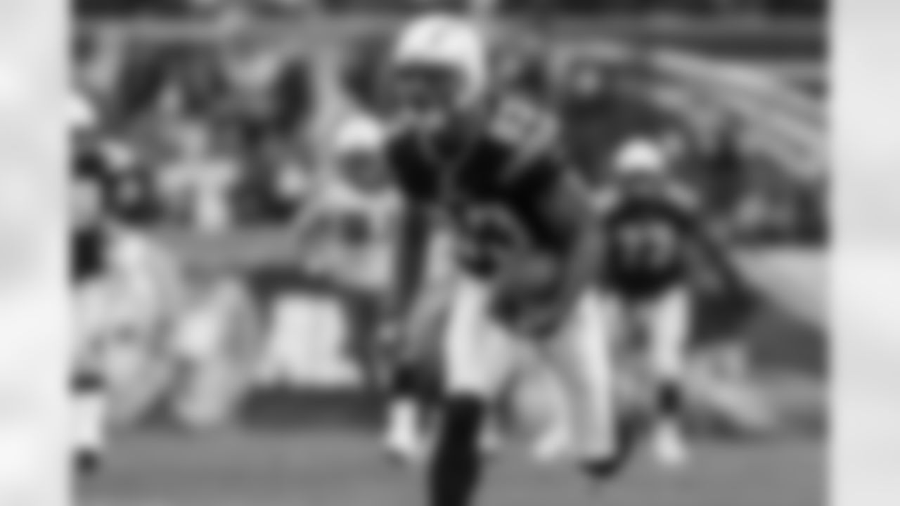 Relive the Chargers' postseason appearances through images from playoff games, highlighting the moments that defined the team in the NFL playoffs.