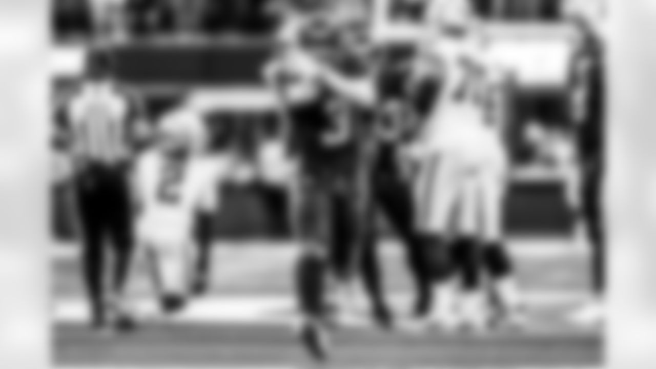 Take a look back at the Chargers Week 13 matchup with the Raiders in monochrome.