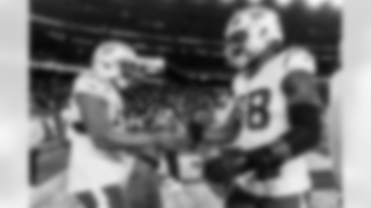 Check out the best shots from the Chargers Wild Card matchup against the Patriots!