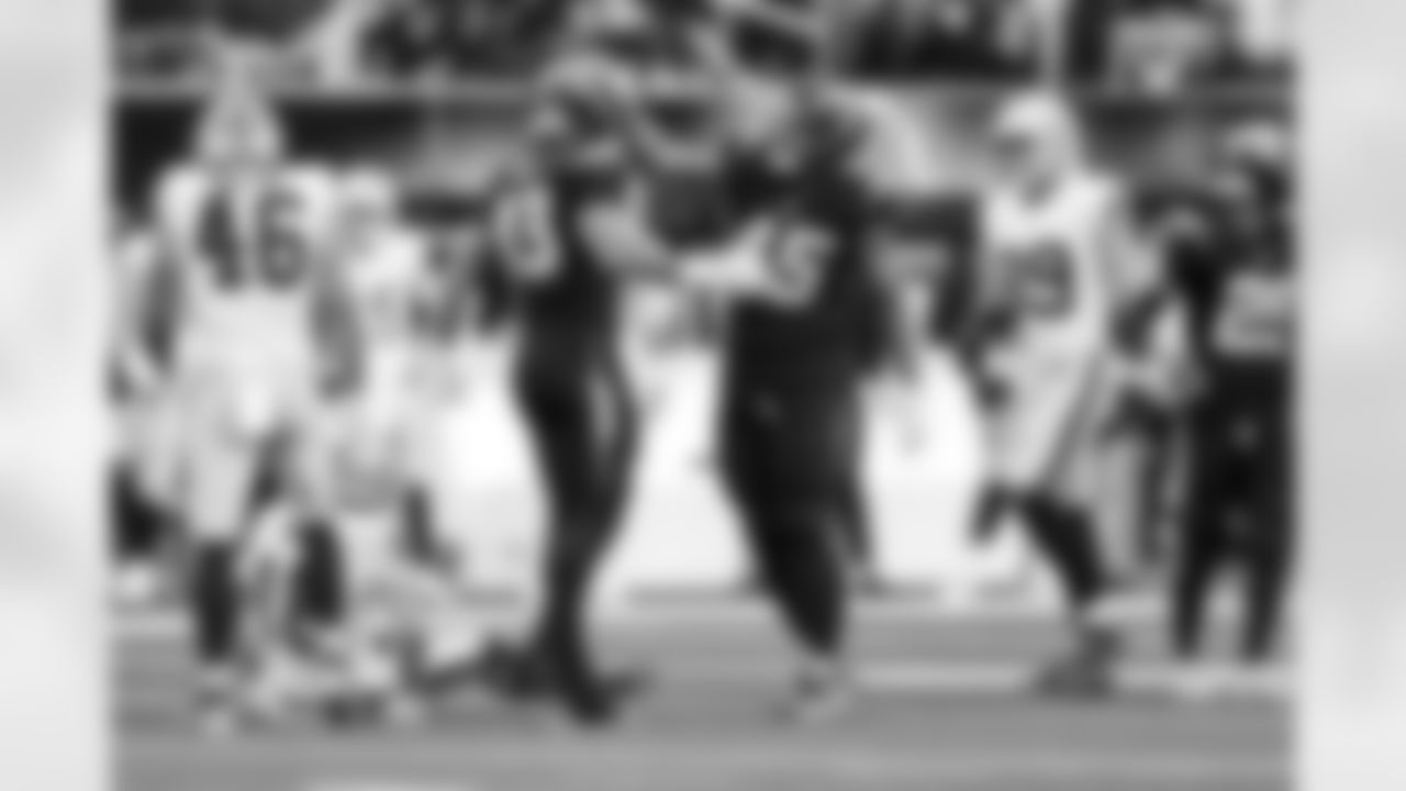 LB Troy Dye (43) and OLB Tuli Tuipulotu (45)