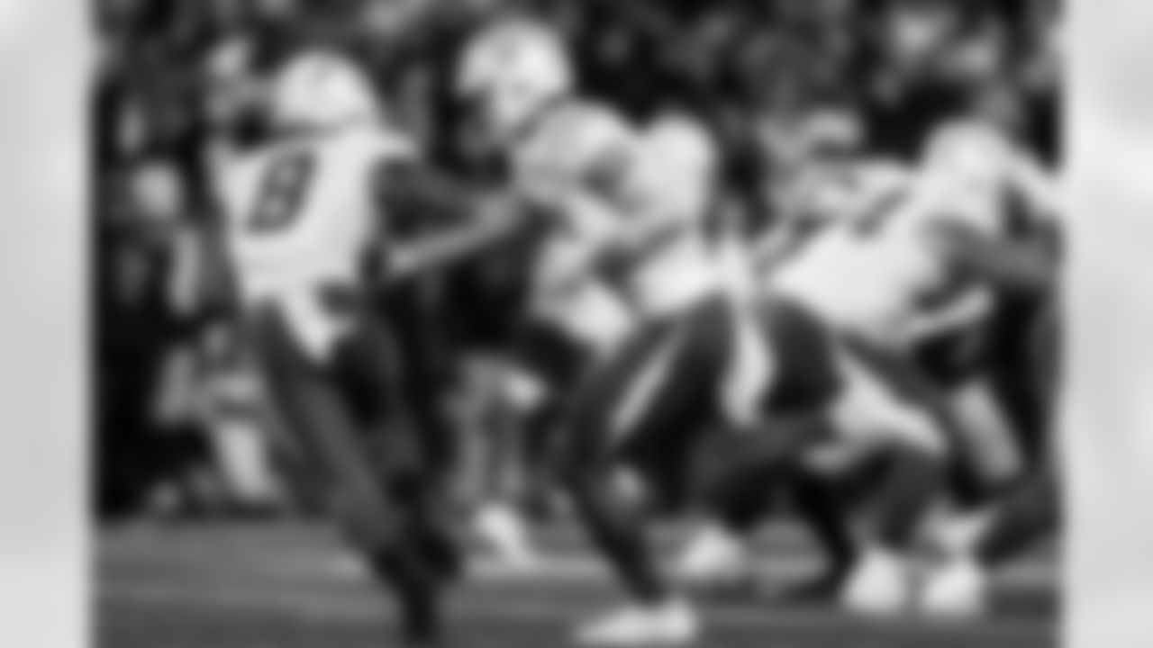 Check out the best shots from the Chargers Wild Card matchup against the Patriots!