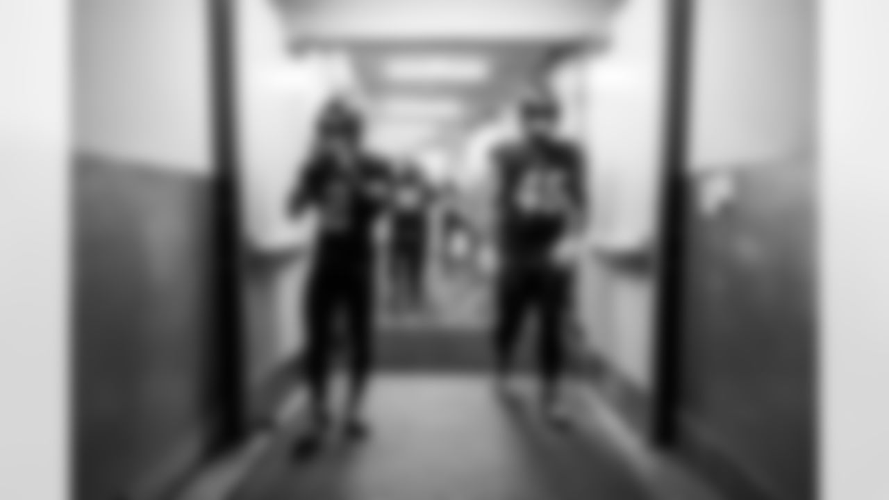 DB Elijah Molden (2) and OLB Tuli Tuipulotu (45)