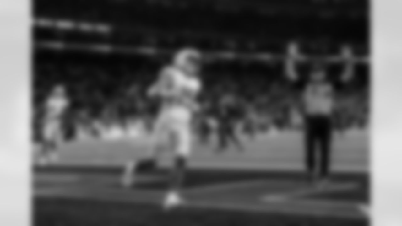 Check out the best shots from the Chargers Wild Card matchup against the Texans!