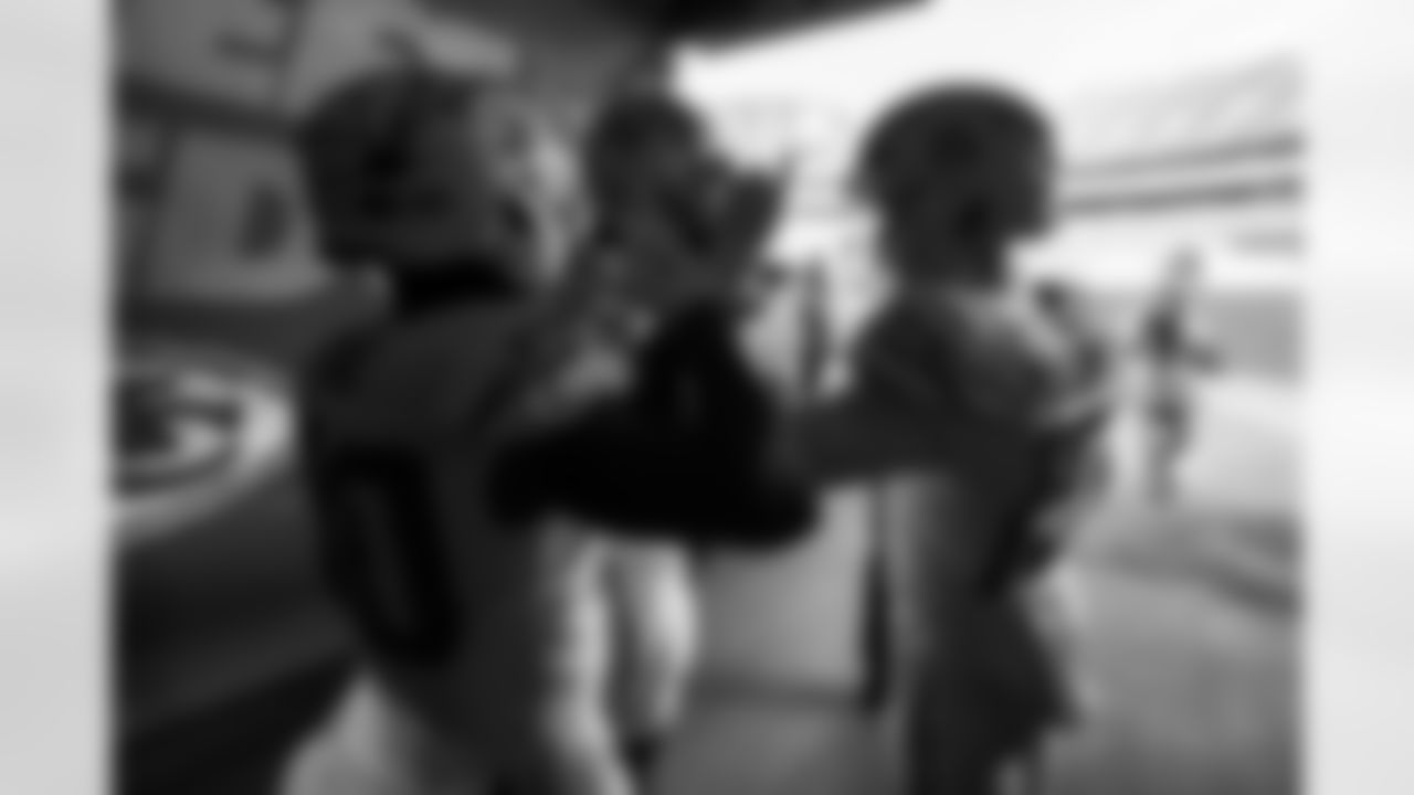 RB Kimani Vidal (30), WR KeAndre Lambert-Smith (84) and WR Ladd McConkey (15)