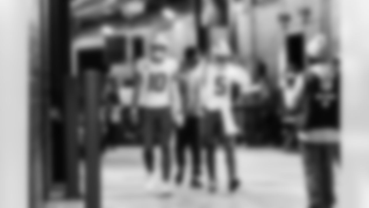 QB Justin Herbert (10) and QB Trey Lance (5)