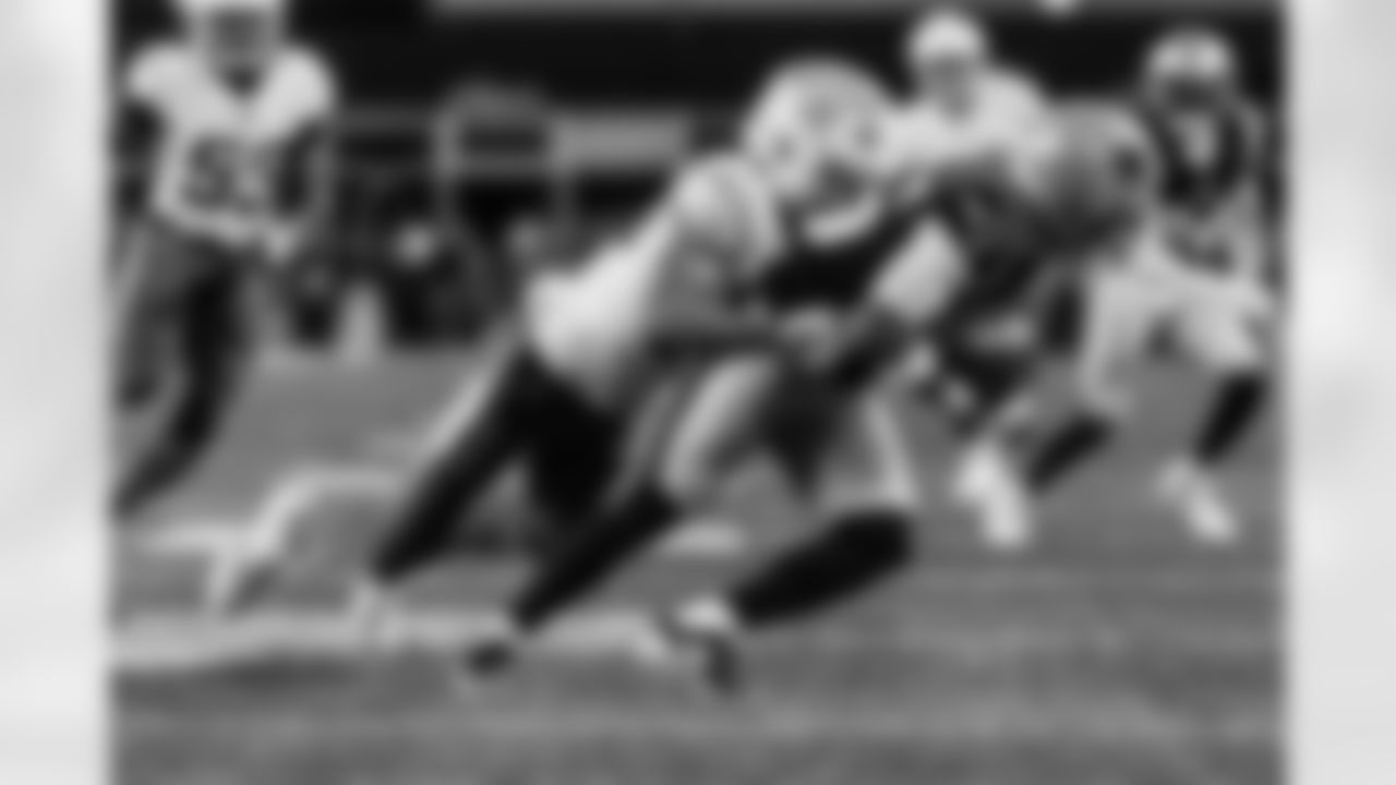 Check out the best shots from the Chargers Wild Card matchup against the Patriots!