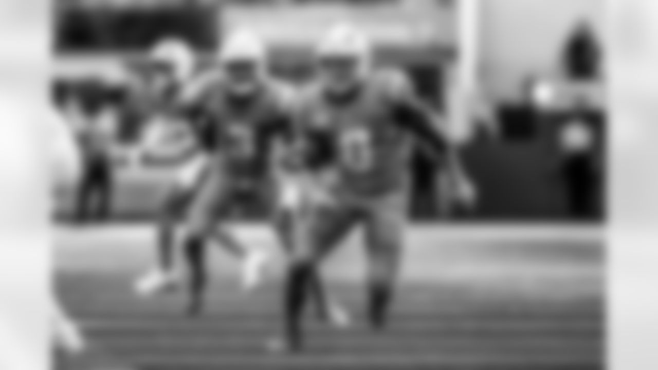Take a look back at the Chargers Week 5 matchup with the Commanders in monochrome!