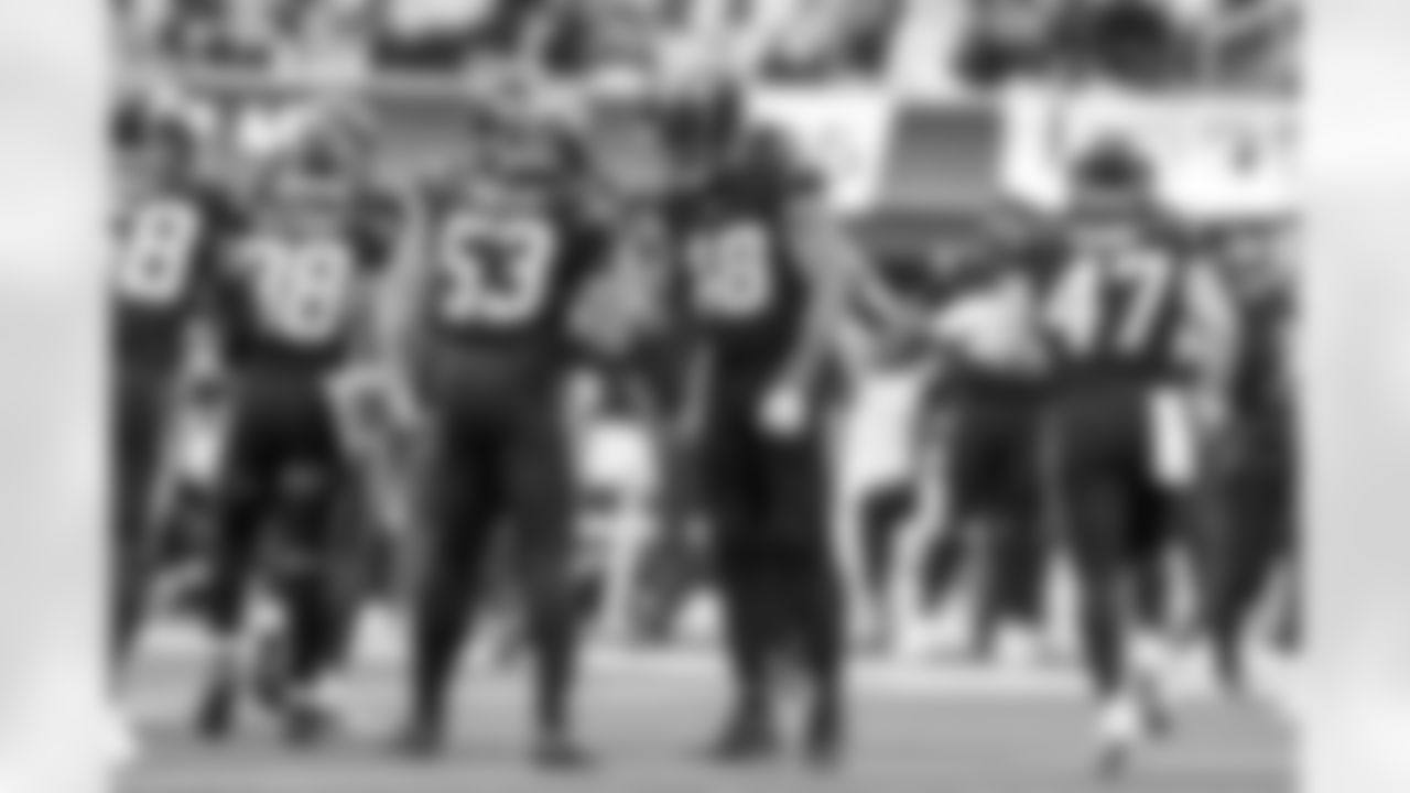 LB Del'Shawn Phillips (53) and OLB Bud Dupree (48)