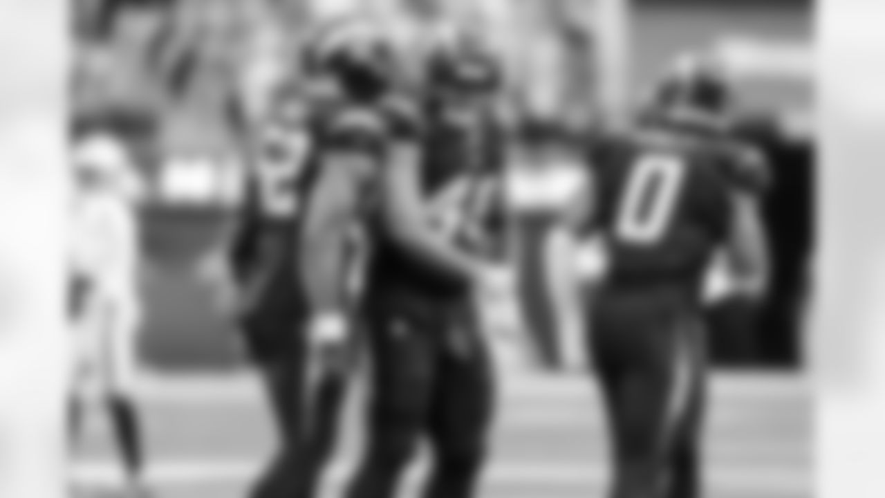 OLB Khalil Mack (52), OLB Tuli Tuipulotu (45) and LB Daiyan Henley (0)