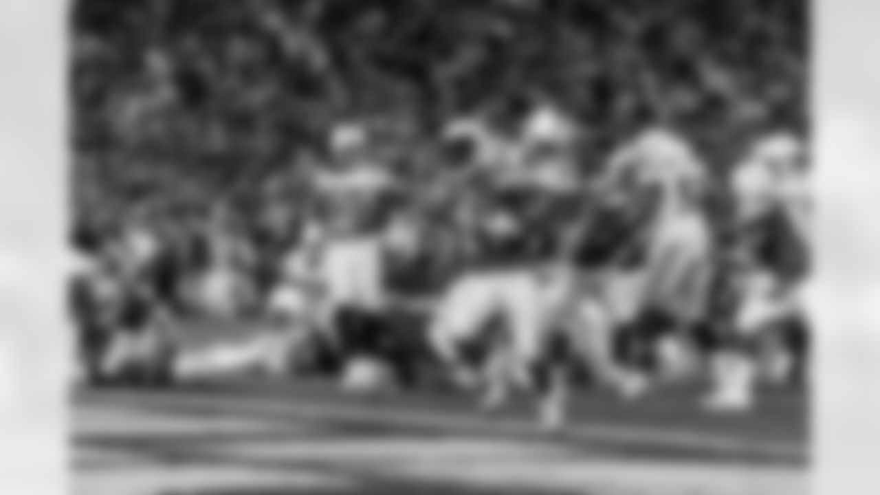 Relive the Chargers' postseason appearances through images from playoff games, highlighting the moments that defined the team in the NFL playoffs.