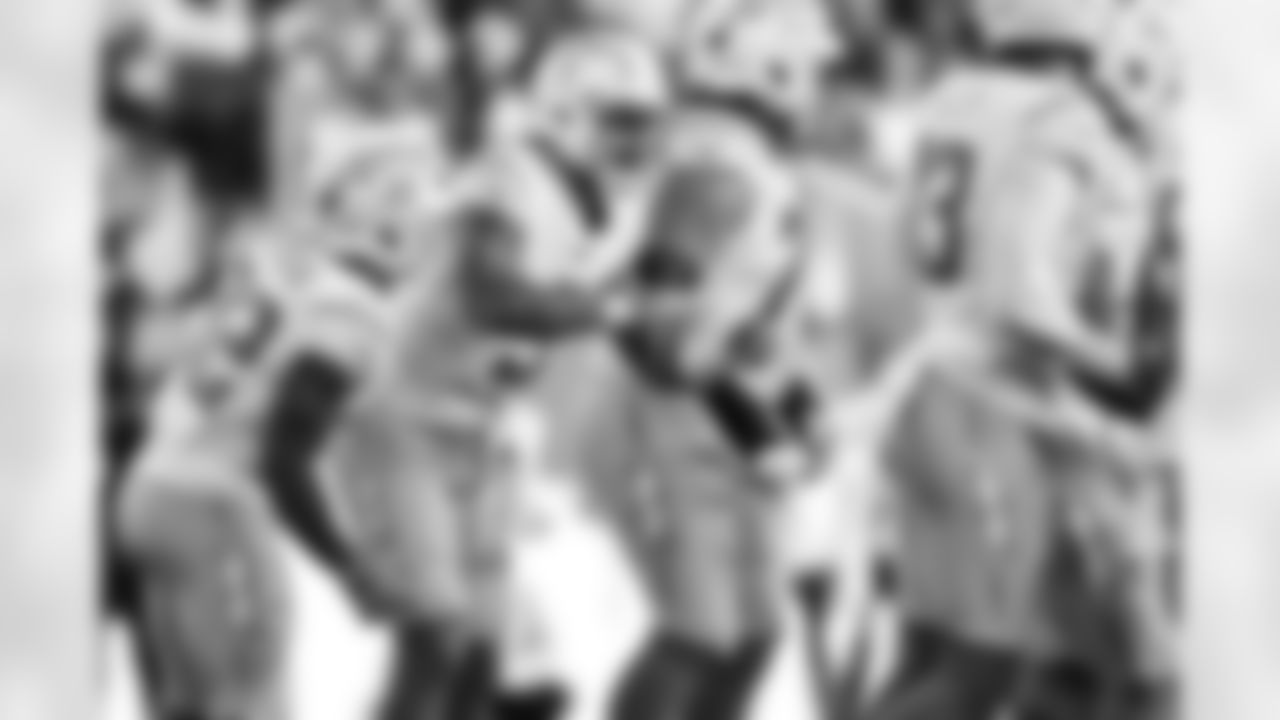 RB Jaret Patterson (32) and QB Trey Lance (5)