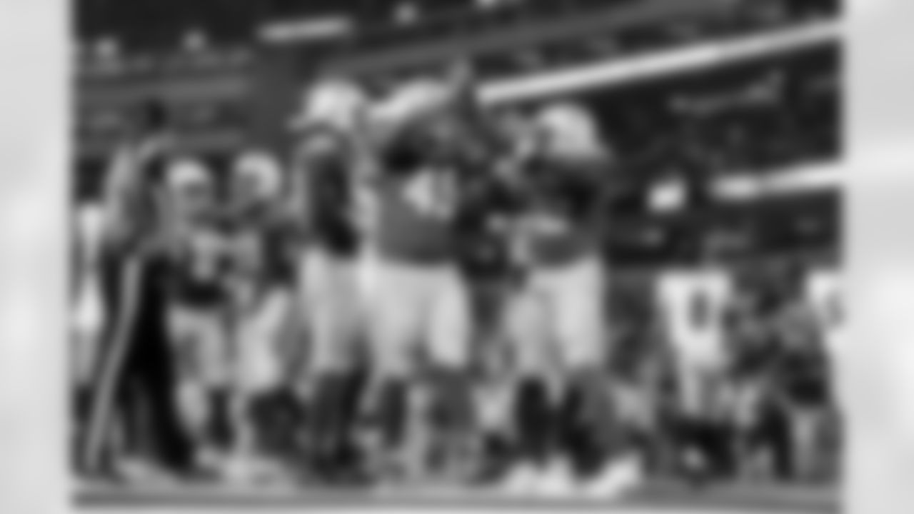 OLB Odafe Oweh (98), OLB Tuli Tuipulotu (45) and OLB Khalil Mack (52)