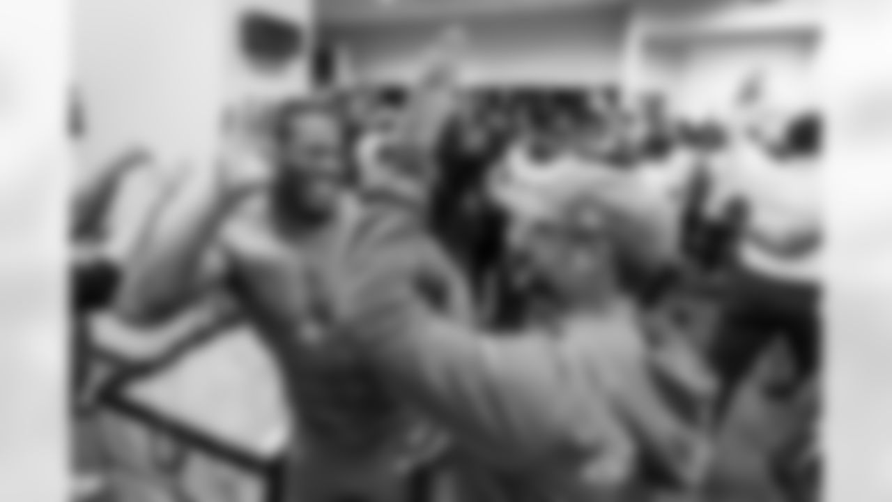 A High-Five For the Postseason - There were a lot of chances for fun locker room shots this season with another year of 11 wins, but this was probably my favorite. It's become a tradition under Harbaugh for everyone to high five after a victory and after win No. 11 against the Cowboys essentially put them in the playoffs for a second-straight year, Daiyan Henley encapsulated the feeling in the room with pure joy finding Defensive Coordinator Jesse Minter for the high-five.