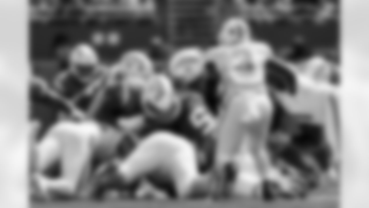 G Mekhi Becton (73) and QB Justin Herbert (10)