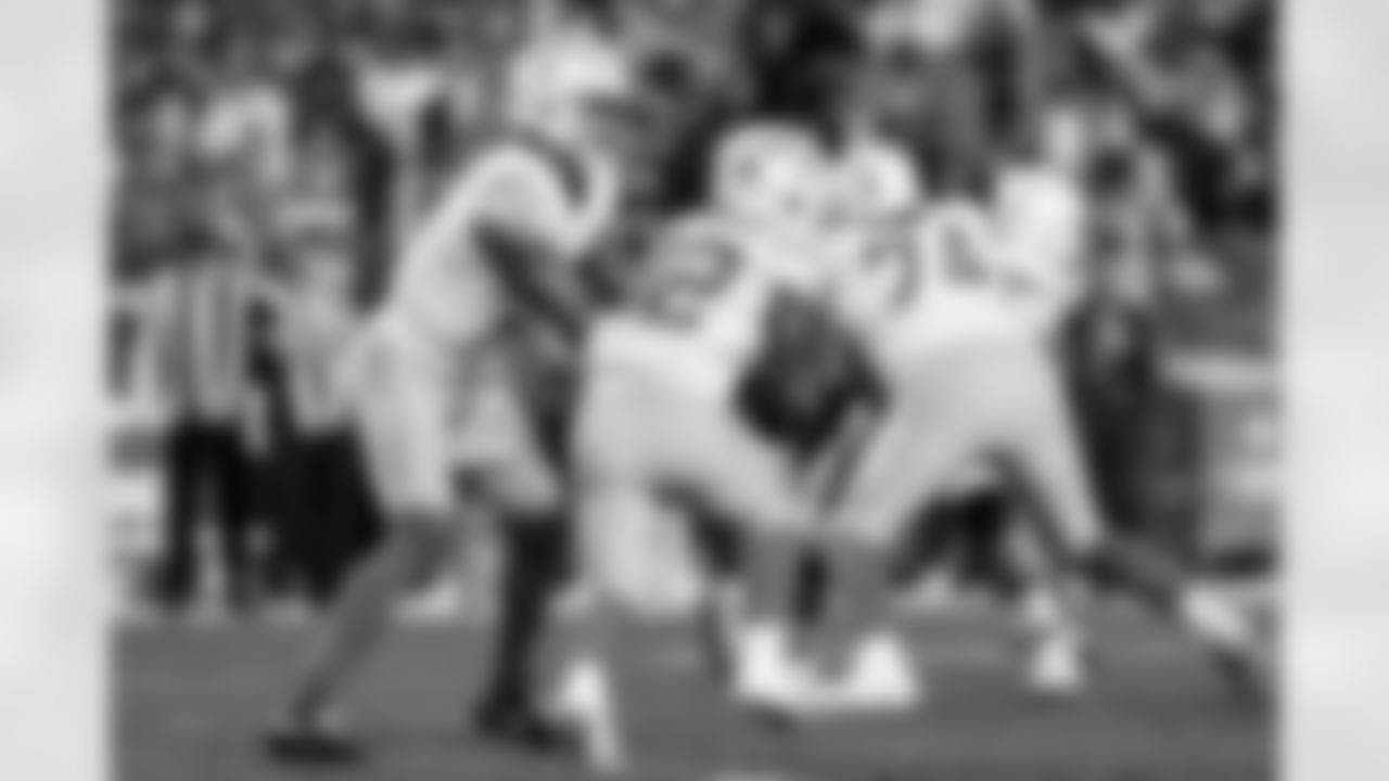 QB Trey Lance (5) and RB Jaret Patterson (32)