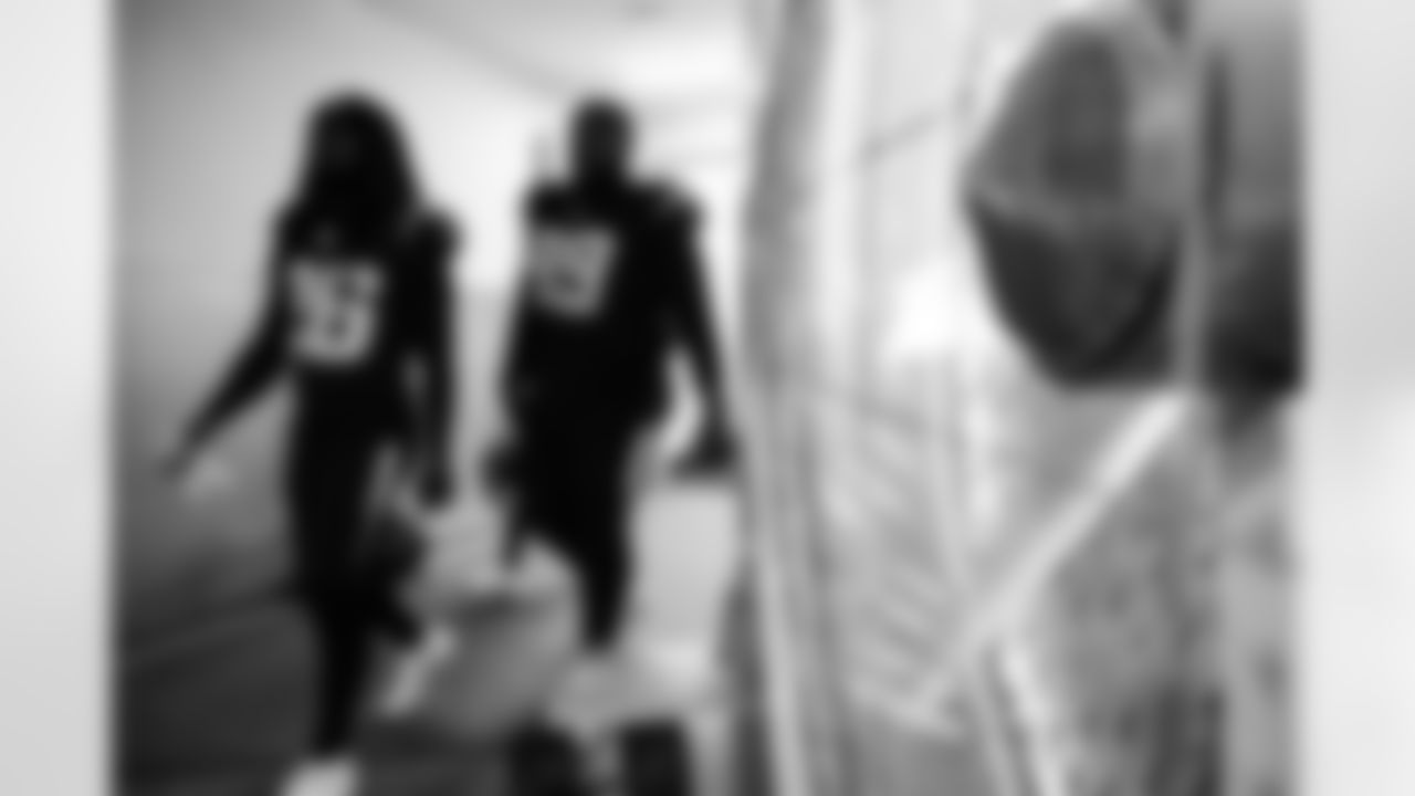 CB Donte Jackson (26) and DT Jamaree Caldwell (99)