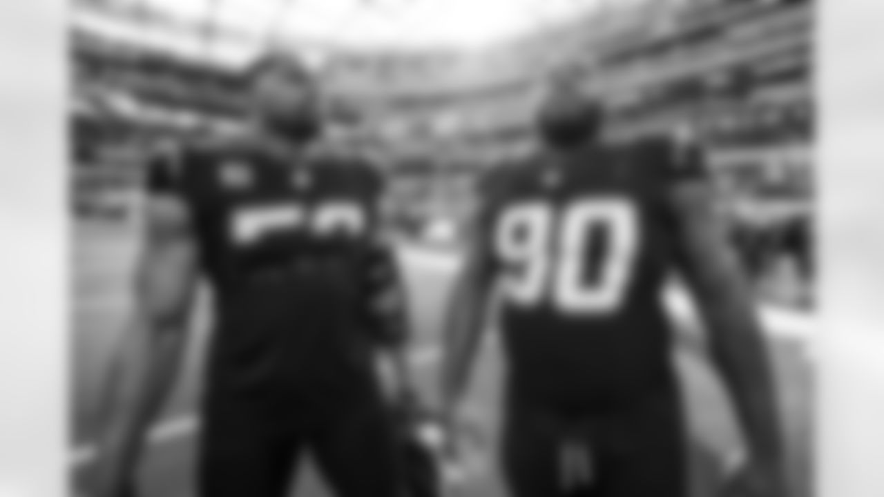 OLB Khalil Mack (52) and DL Teair Tart (90)